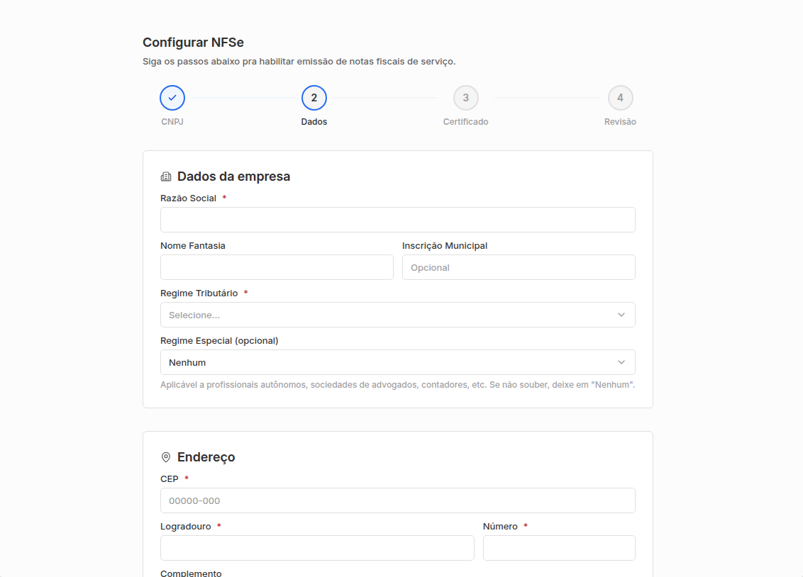 Passo 2 do assistente com dados da empresa (razão social, nome fantasia, inscrição municipal, regime tributário, regime especial) e endereço.